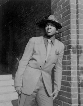 Alvin C. Hollingsworth in neat suit with hat